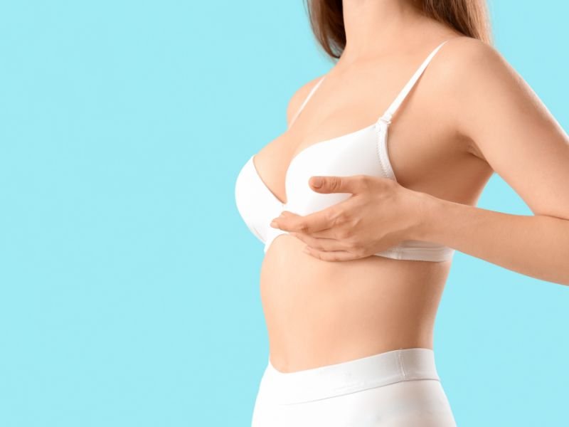 A side view of a properly fitted bra where the band level on the back is parallel to the ground, the straps are snug but comfortable, and there is no bulging or gaping fabric