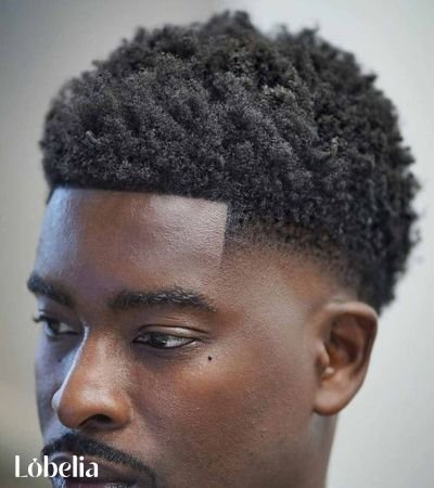 Bald Fade Style with Curly Top