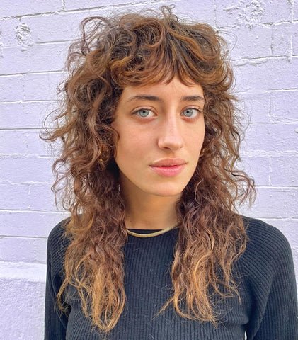 Curly Shag with Layered Bangs