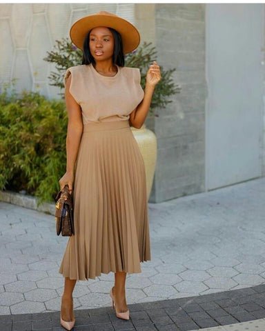 Neutral Top Paired with Pleated Skirt