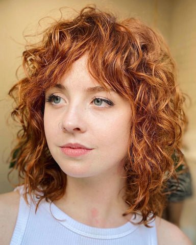 Short Layered Curls with Bangs
