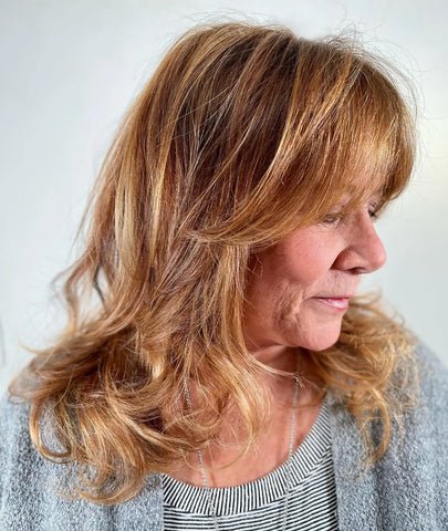 Shoulder-Length Waves with Side-Swept Bangs
