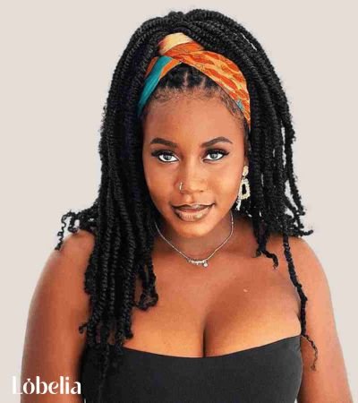 Shoulder Length Kinky Twists in a Top Knot