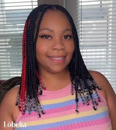 Shoulder Length Kinky Twists with a Center Part