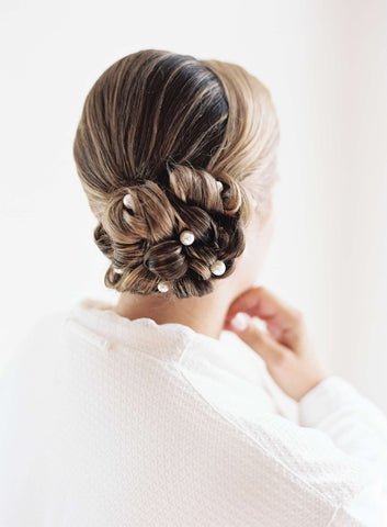 Side Bun with Loose Strands