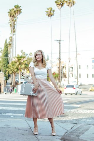 Vintage-Inspired Blouse Paired with Pleated Skirt