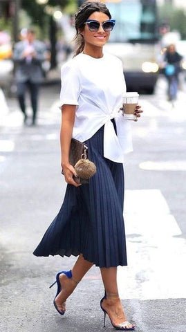 White Blouse Paired with Pleated Skirt
