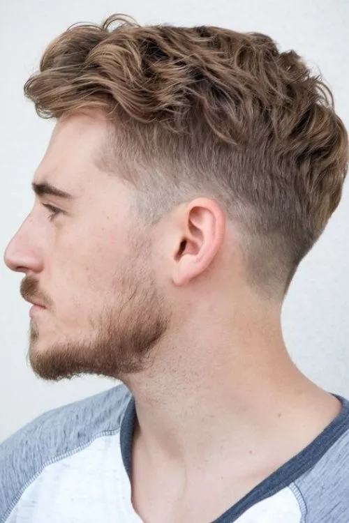 11. Messy Curls with Mid Fade