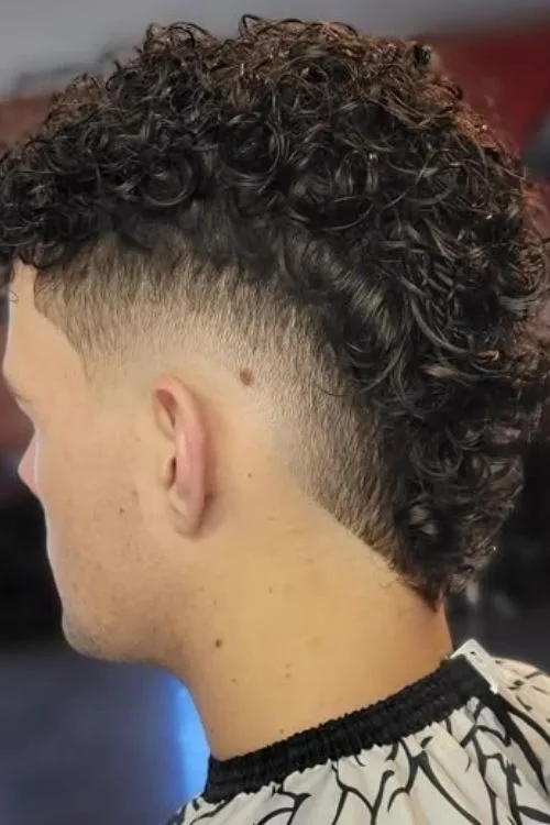 12. Curly Mohawk Fade