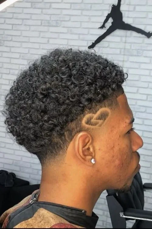 15. Short Curly Taper with Sideburn Design