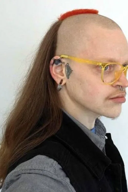 skullet with a head tattto