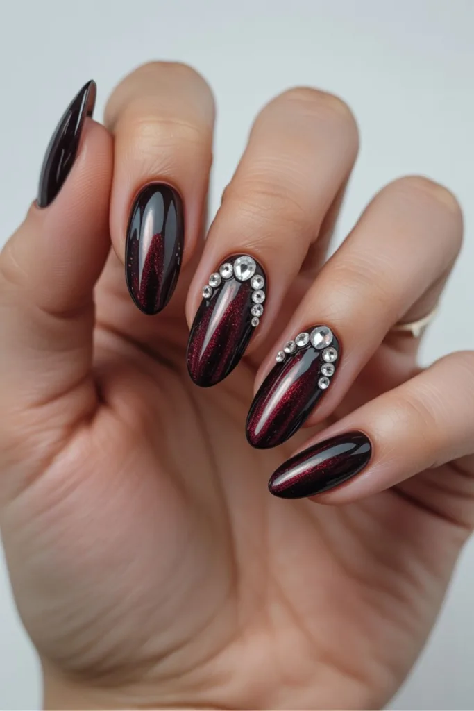 Cat Eye Nails With Rhinestone Embellishments